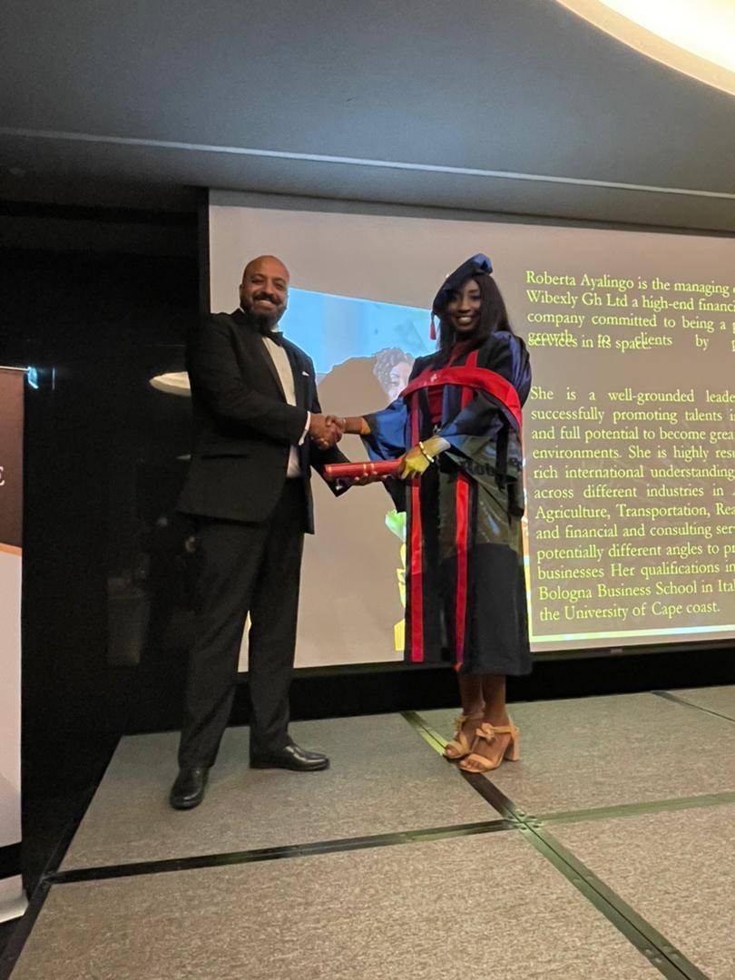 Roberta Ayalingo receiving her Honorary Doctorate Degree