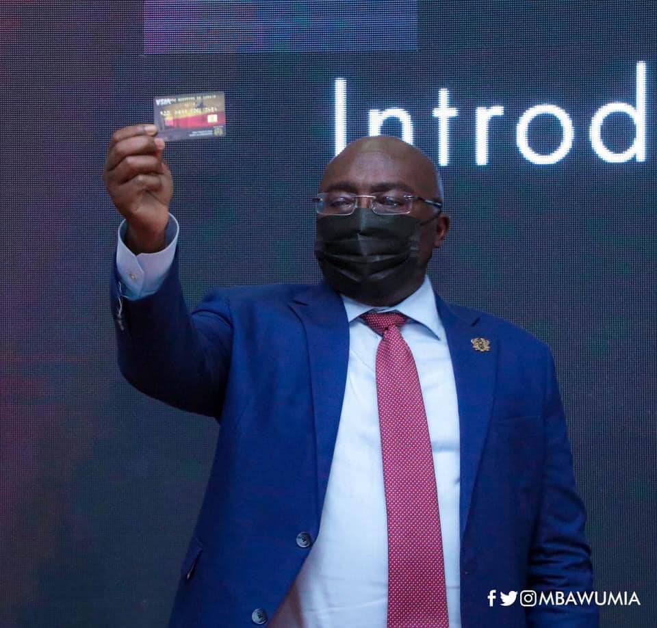 Dr. Bawumia holding a replica of the e-Travel Card