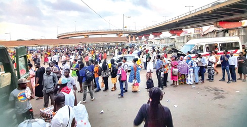 Commuters waiting for public transport in Ghana